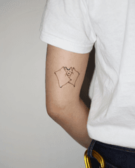 Peeking Animal in Blanket Tattoo