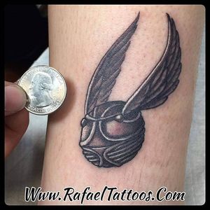 Rafael with another Harry Potter tattoo. Little golden quidditch piece. #nyc #ny #newyork #blackandgrey #quidditch #harrypotter #harrypottertattoo #jkrowling #magic #hogwarts #movie 