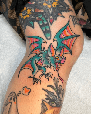 Colorful bat tattoo