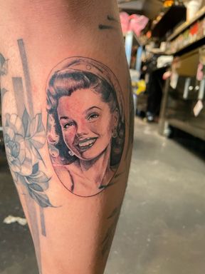 Black and Gray Portrait Tattoo