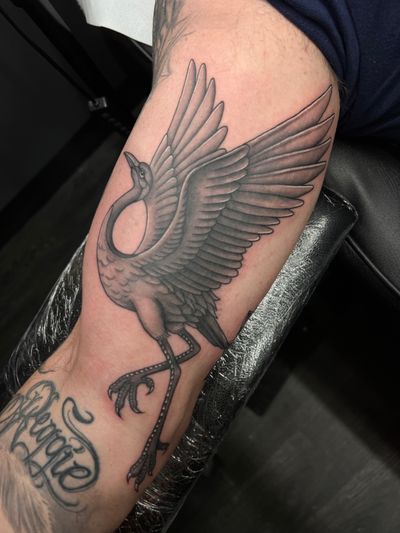 Illustrative black and gray tattoo of a majestic heron by Kateryna Goshchanska.