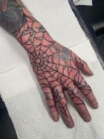 Spiderweb Tattoo with Skull and Crossbones