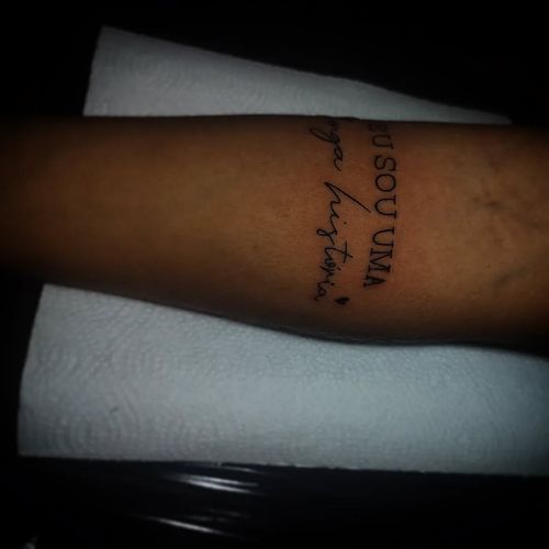 Script Arm Tattoo 'I Am A Long Story'