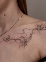 Delicate Butterfly Fine Line Collarbone Tattoo