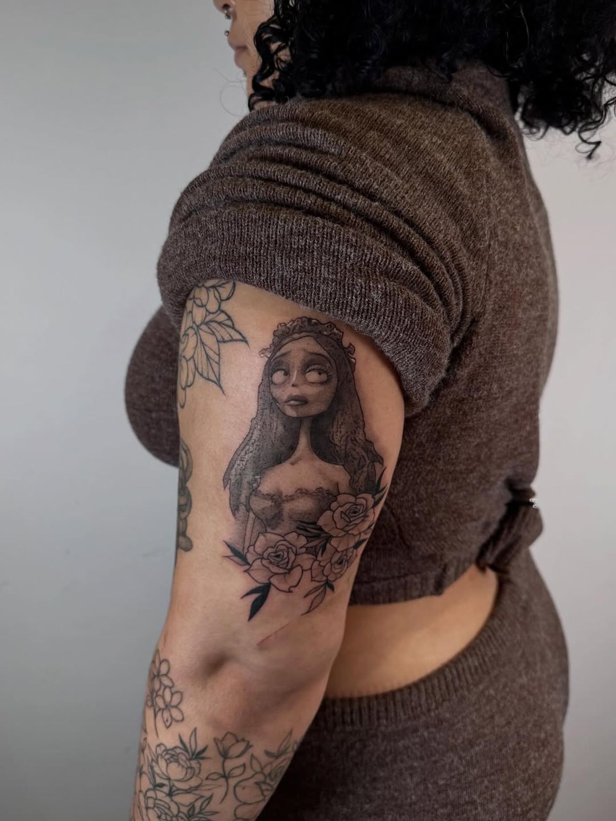 floral arm tattoo