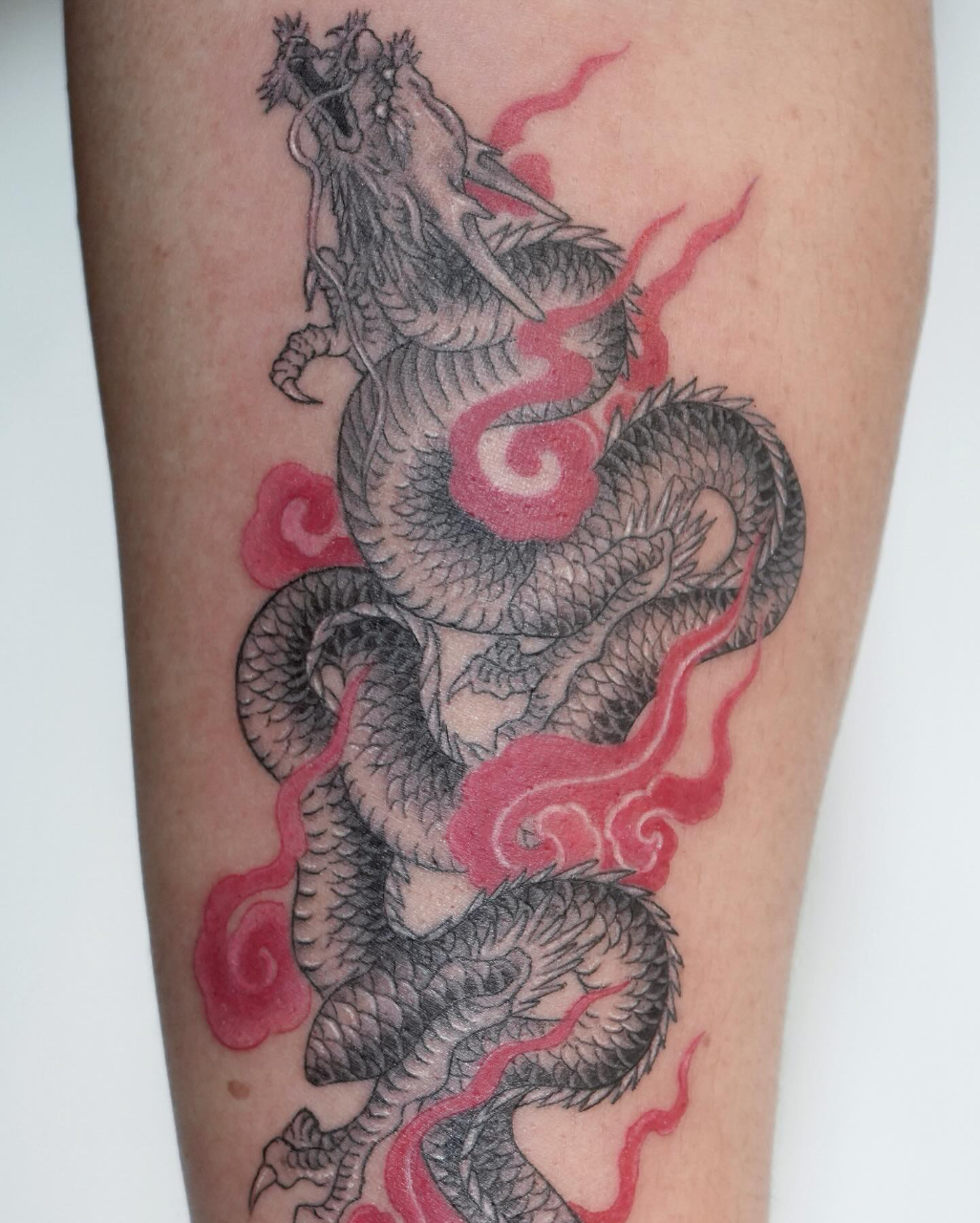 Feminine Dragon and Flower Tattoos