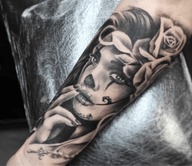 Chicano Woman with Roses Tattoo