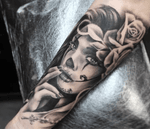 Chicano Woman with Roses Tattoo