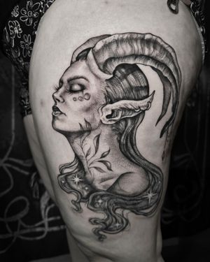 Capricorn star sign lady face tattoo 