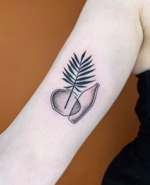 A stunning blackwork and illustrative tattoo of a delicate vase with a beautiful plant by Alessia Lo Piccolo.