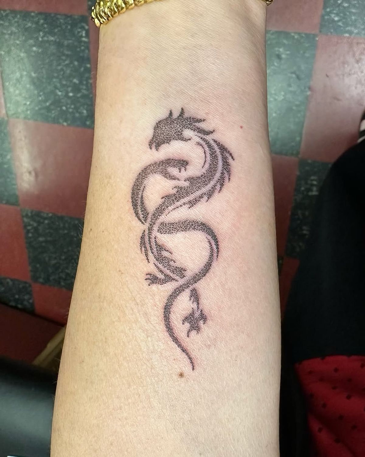 delicate back tattoo