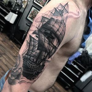 Black and grey ship by Gustavo Rizerio