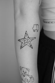 Swirly Star Tattoo