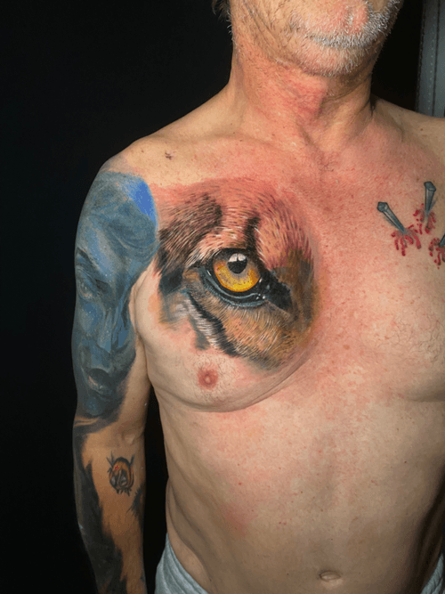 Realistic Tiger Eye Chest Tattoo