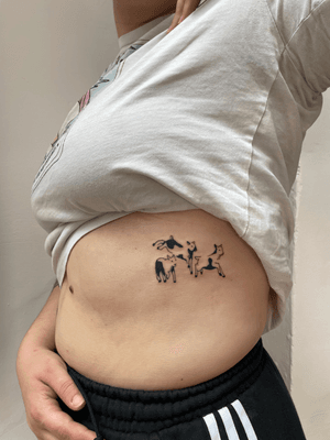 Illustrative blackwork tattoo by Louisa Williams featuring farm animals in a minimal style.