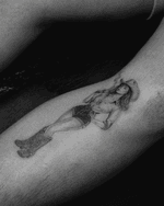Reclining Cowgirl Tattoo