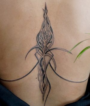 Embrace the beauty of organic flow with this intricate blackwork and dotwork pattern tattoo by Mona Noir Tattoo.