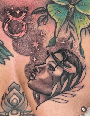 A black and gray, dotwork tattoo featuring an illustrative depiction of a Taurus woman surrounded by stars. Located in New York, US.