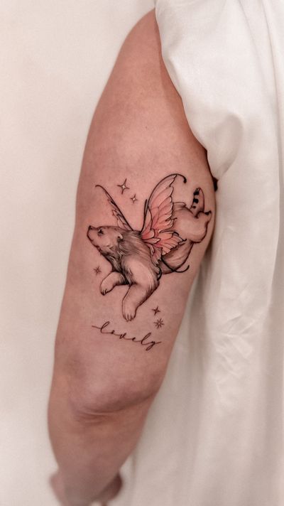 Get a stunning illustrative tattoo featuring a bear and fairy by the talented artist Alex Caldeira.