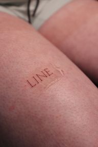 Minimalist 'LINE' Tattoo