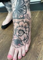 Tattoo of a Flower with a Soot Sprite