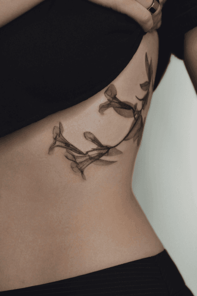 Flower tattoo in X-ray style