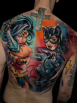 Get a colorful and vibrant tattoo featuring Wonder Woman and Cat Woman from DC comics by Cloto.tattoos.