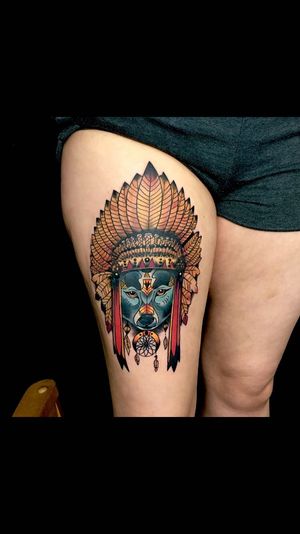 Intricately detailed neo-traditional design on upper leg by Sandro Secchin. A powerful wolf intertwined with a mystical dreamcatcher.
