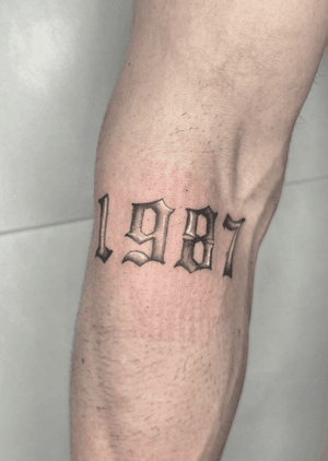 Bold lettering tattoo style