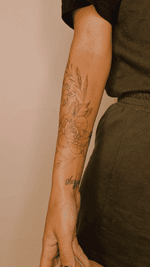 Colourful fine-line floral extension to existing ornaments, free-hand design