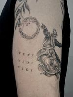 Classical Figure with Latin Script Tattoo