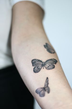 Embrace the delicate beauty of nature with this illustrative butterfly tattoo by George Francis. Perfect for those seeking a touch of elegance and sophistication.