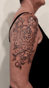 Mandala and Floral Arm Tattoo