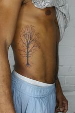 Bare Tree with Hidden Faces