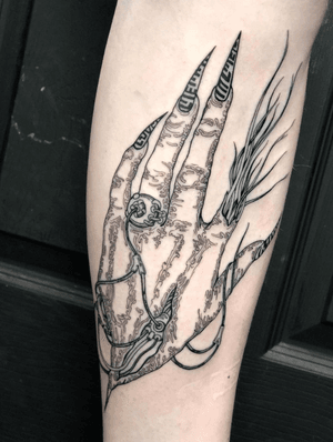 Illustrative hand tattoo design with a cyberpunk theme by Amandine Canata. Futuristic and edgy art.