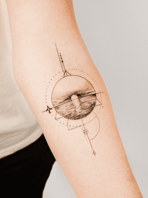 Abstract black and gray fine line geometric tattoo featuring a sunset over the sea with a beach, airplane, and a sun. By Gabriele Edu.