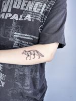 Small Wolf Tattoo
