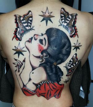 Beautifully detailed illustrative traditional tattoo by Megan Foster featuring a star, butterfly, and graceful woman.