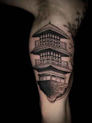 Unique and intricate black and gray illustration of a traditional Japanese pagoda, expertly done by tattoo artist Ben Twentyman.