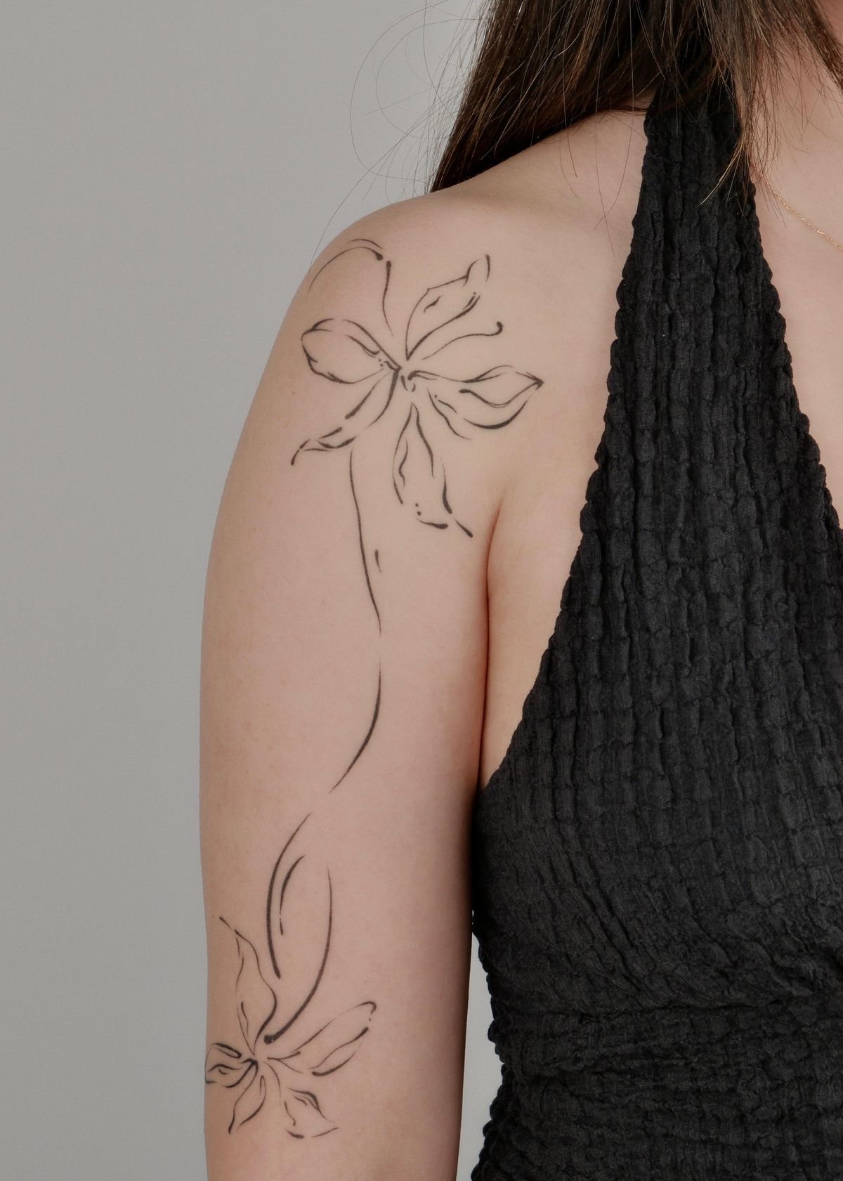 elegant back tattoo