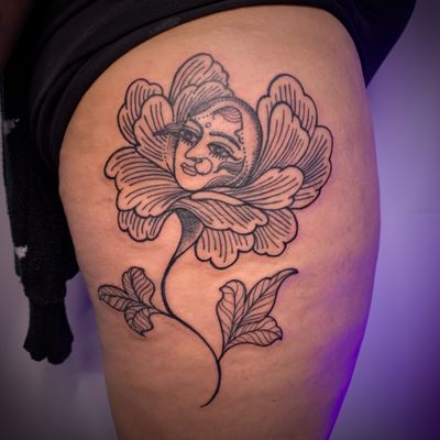 A stunning blackwork and dotwork tattoo of a beautifully detailed flower, created by David Barclay.