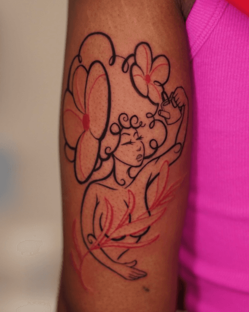 Woman with Flowers Tattoo