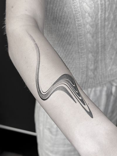 A mesmerizing black and gray abstract tattoo created with meticulous dotwork technique by artist Oliver Whiting.