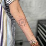 The Ouroboros A term derives from Ancient Greek - The Ouroboros is often interrupted as a symbol for eternal cyclic renewal. Magali @magali.ruani travelled from Rotterdam to add to her tattoo collection, she added this gorgeous Ouroboros design, which to her represents Karma. DM to book @thelondonsocial • • • #finelinelondon #londonfinelinetattoo #Finelinetattoo #lineworktattoo #explorepage #finelinetattoolondon #londontattooartist