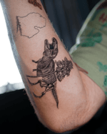 T-Rex and Flowers Tattoo