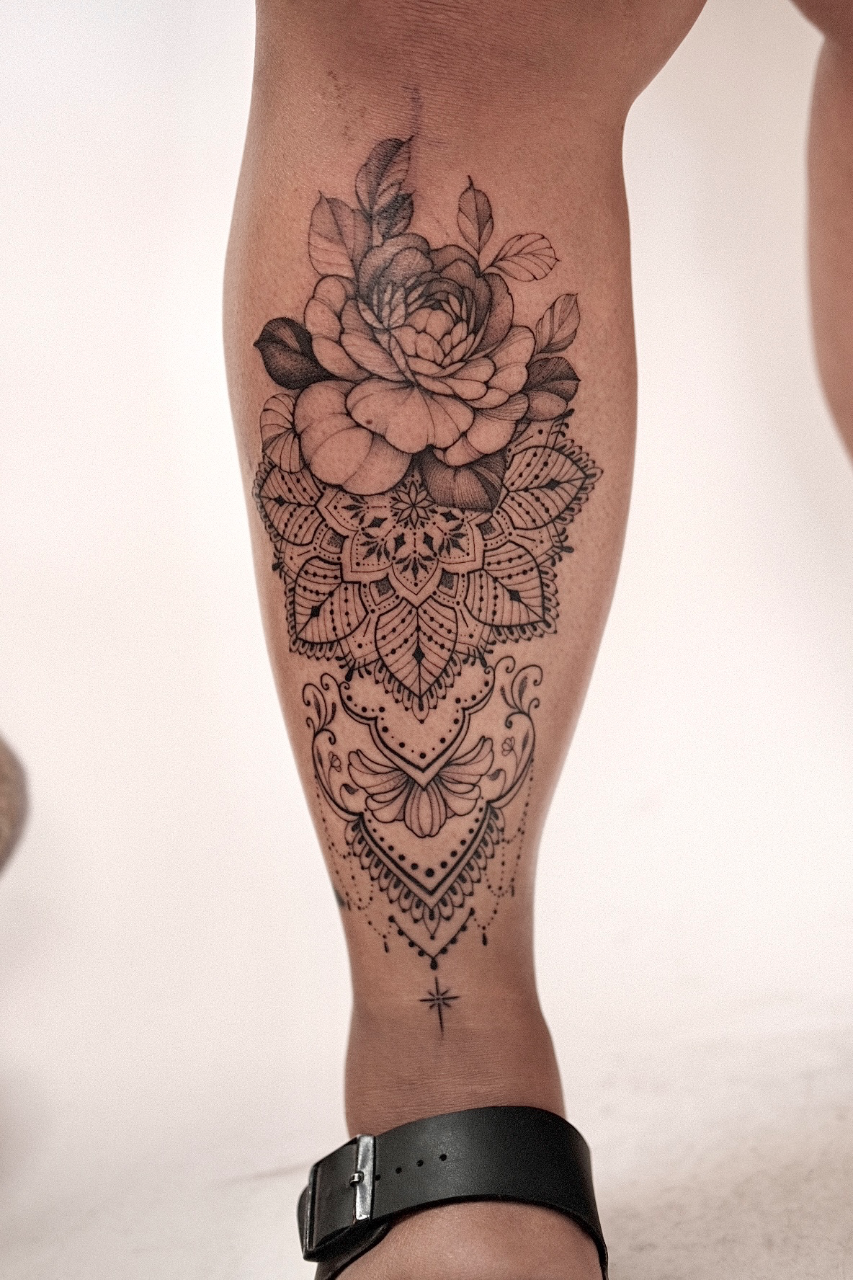 Flower Tattoo on Lower Leg - A Natural Touch