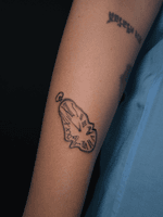 Dalí melting clock tattoo