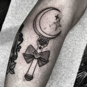 Embrace your inner moon princess with this stunning Sailor Moon and Moonstick tattoo by Barbara Nobody.