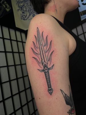 This illustrative tattoo of a dagger by Marc ‘Cappi’ Caplen captures the timeless appeal of traditional tattoo motifs.