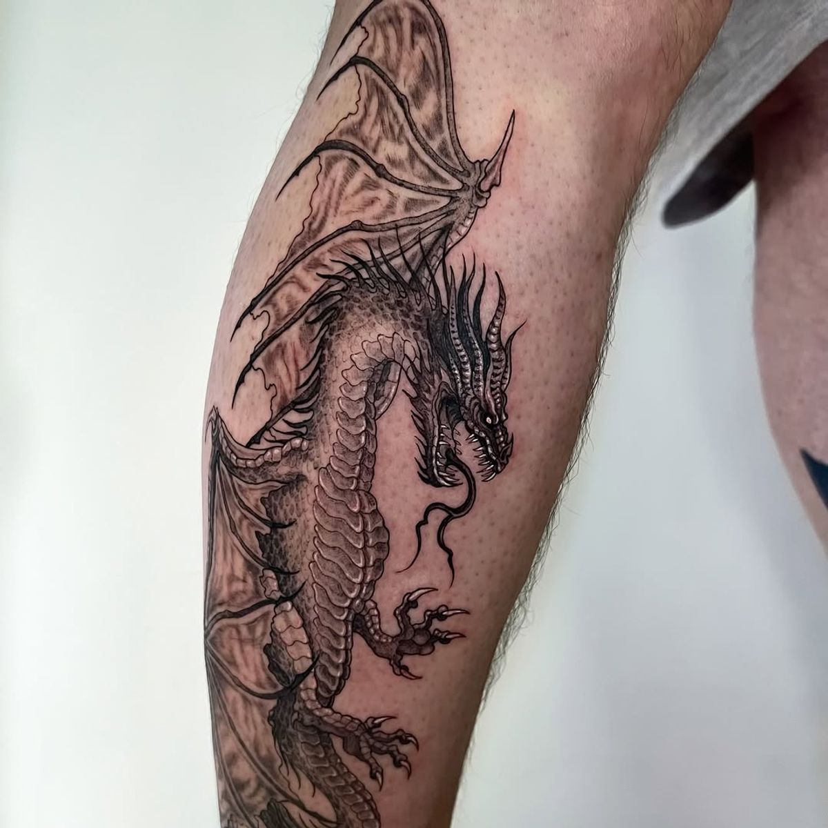 ornamental rib tattoo